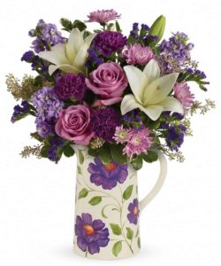 white lilies with lavender roses and purple flowers