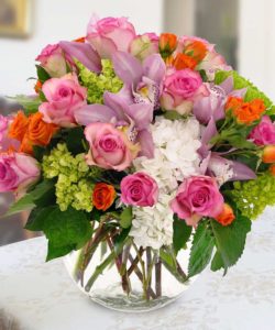 white hydrangea with assorted pink flowers