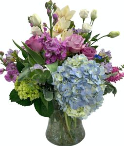  stunning work of art comprised of premium floral varieties, including Hydrangea, Roses, Spray Roses, Orchids, Lavender and more! * Flowers & colors may vary slightly